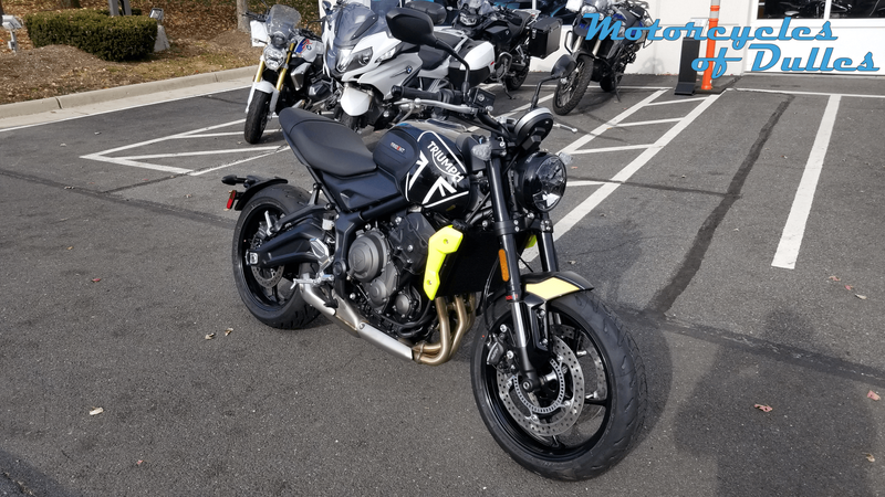 2024 Triumph Trident in a Jet Black/Triumph Racing Yellow exterior color. Motorcycles of Dulles 571.934.4450 motorcyclesofdulles.com 