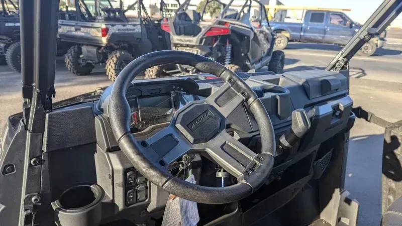 2025 POLARIS RANGER CREW XP 1000 TEXAS EDITION BLACK CRYSTAL in a BLACK CRYSTAL exterior color. Family PowerSports (877) 886-1997 familypowersports.com 