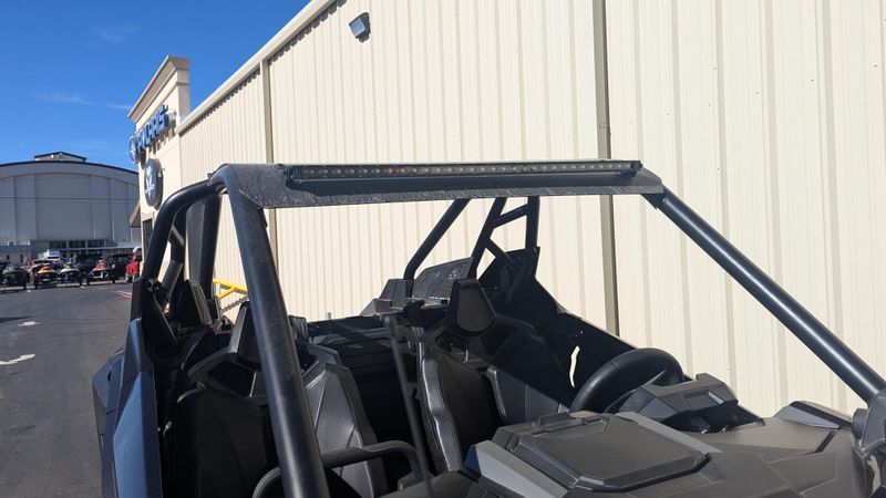 2024 POLARIS RZR PRO XP ULTIMATE  SUPER GRAPHITE in a GRAPHITE exterior color. Family PowerSports (877) 886-1997 familypowersports.com 