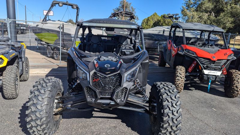 2025 CAN-AM MAVERICK X3 MAX X RS TURBO RR TRIPLE BLACK in a TRIPLE BLACK exterior color. Family PowerSports (877) 886-1997 familypowersports.com 