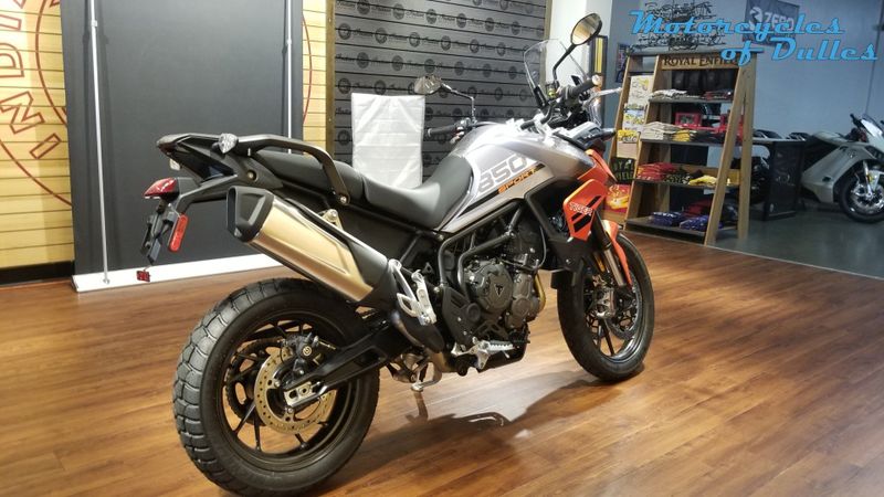 2023 Triumph Tiger 850 in a Graphite/Baja Orange exterior color. Motorcycles of Dulles 571.934.4450 motorcyclesofdulles.com 