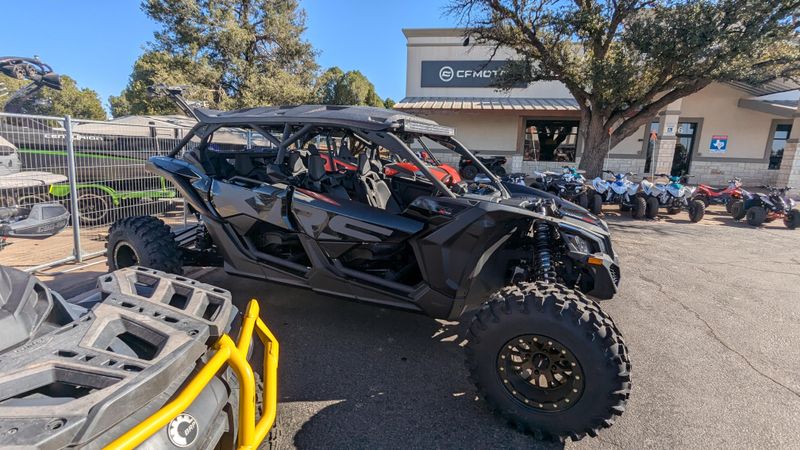 2025 CAN-AM MAVERICK X3 MAX X RS TURBO RR TRIPLE BLACK in a TRIPLE BLACK exterior color. Family PowerSports (877) 886-1997 familypowersports.com 