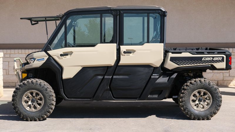 2025 CAN-AM DEFENDER MAX LIMITED CAB HD10 DESERT TAN AND STEALTH BLACK in a DESERT TAN AND STEALTH BLACK exterior color. Family PowerSports (877) 886-1997 familypowersports.com 