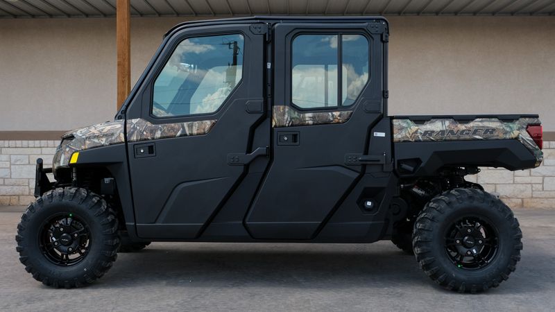 2024 POLARIS RANGER CREW XP 1000 NS ULT  RIDE CMD PPC in a CAMO exterior color. Family PowerSports (877) 886-1997 familypowersports.com 