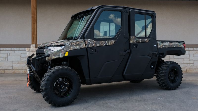 2024 POLARIS RANGER CREW XP 1000 NS ULT  RIDE CMD PPC in a CAMO exterior color. Family PowerSports (877) 886-1997 familypowersports.com 