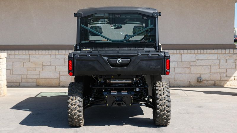 2025 CAN-AM DEFENDER MAX LIMITED CAB HD10 DESERT TAN AND STEALTH BLACK in a DESERT TAN AND STEALTH BLACK exterior color. Family PowerSports (877) 886-1997 familypowersports.com 