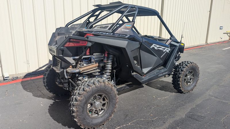 2024 POLARIS RZR PRO XP ULTIMATE  SUPER GRAPHITE in a GRAPHITE exterior color. Family PowerSports (877) 886-1997 familypowersports.com 