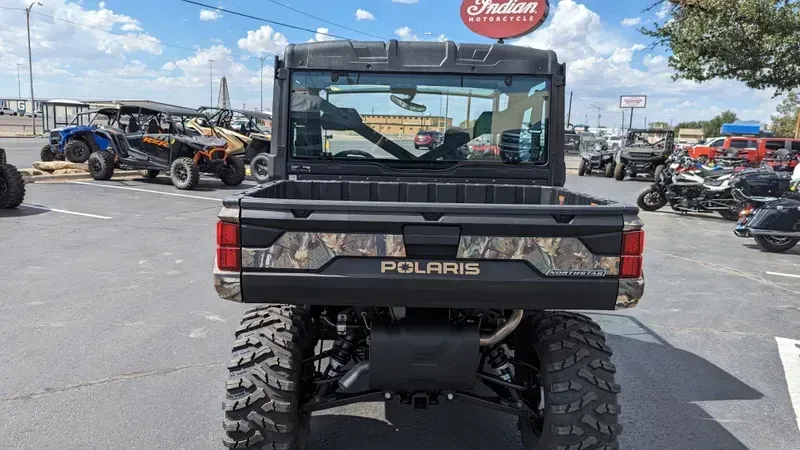 2024 POLARIS RANGER XP 1000 NS ED ULT  RIDE CMD PPC in a CAMO exterior color. Family PowerSports (877) 886-1997 familypowersports.com 