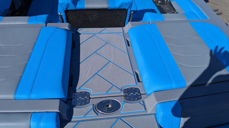 2024 MALIBU MB4932BOAT  in a BLUE exterior color and EBONY AND COOL VAPOR BLUEinterior. Family PowerSports (877) 886-1997 familypowersports.com 