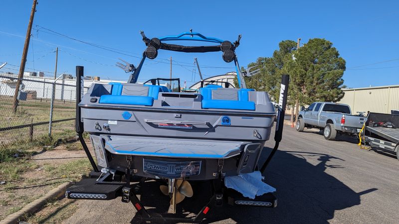 2024 MALIBU MB4932BOAT  in a BLUE exterior color and EBONY AND COOL VAPOR BLUEinterior. Family PowerSports (877) 886-1997 familypowersports.com 
