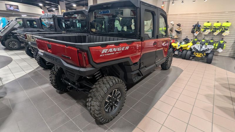 2024 POLARIS RANGER CREW XD 1500 NORTHSTAR EDITION ULTIMATE SUNSET RED in a SUNSET RED exterior color. Family PowerSports (877) 886-1997 familypowersports.com 