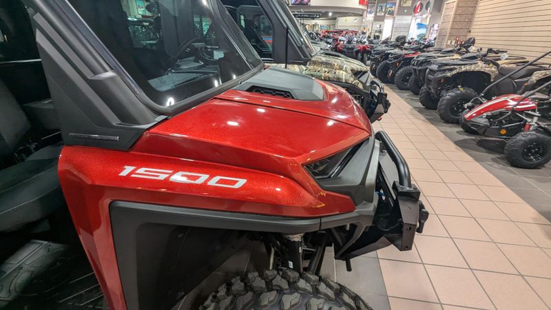 2024 POLARIS RANGER CREW XD 1500 NORTHSTAR EDITION ULTIMATE SUNSET RED in a SUNSET RED exterior color. Family PowerSports (877) 886-1997 familypowersports.com 