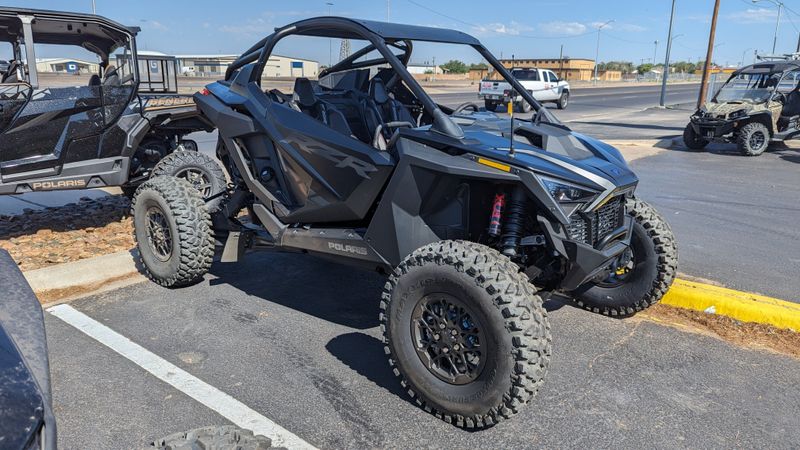 2023 POLARIS RZR PRO R ULTIMATE  STEALTH BLACK in a BLACK exterior color. Family PowerSports (877) 886-1997 familypowersports.com 