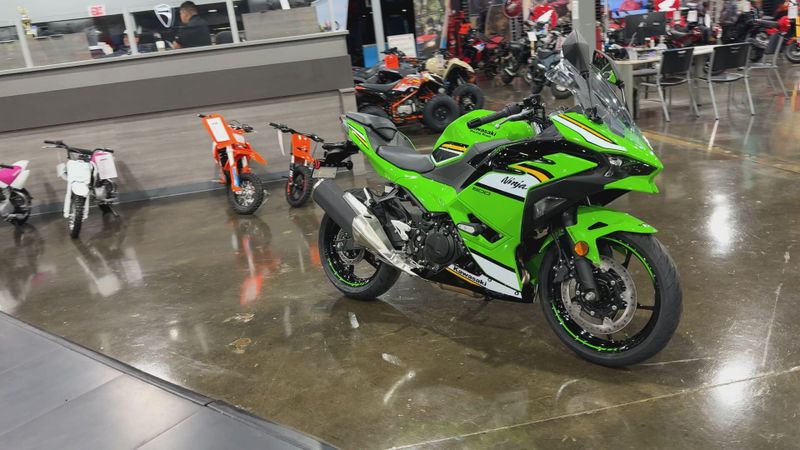 2025 Kawasaki NINJA 500 KRT EDITION SE ABS  in a LIME GREEN/EBONY/PEARL BLIZZARD WHITE exterior color. Del Amo Motorsports of Redondo Beach (424) 390-7811 delamomotorsports.com 