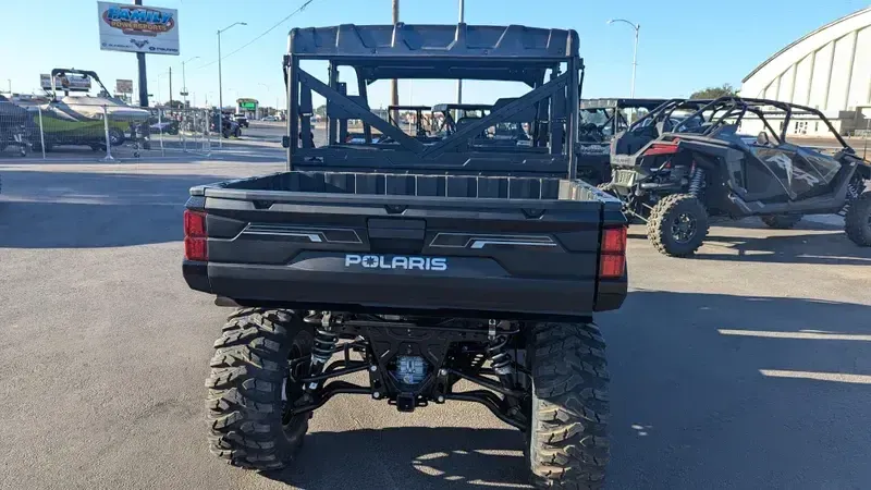 2025 POLARIS RANGER CREW XP 1000 TEXAS EDITION BLACK CRYSTAL in a BLACK CRYSTAL exterior color. Family PowerSports (877) 886-1997 familypowersports.com 