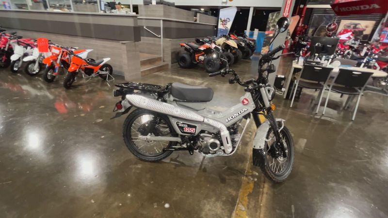 2025 Honda TRAIL 125  in a PEARL SMOKY GRAY exterior color. Del Amo Motorsports of Redondo Beach (424) 390-7811 delamomotorsports.com 