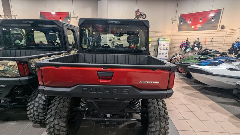 2024 POLARIS RANGER CREW XD 1500 NORTHSTAR EDITION ULTIMATE SUNSET RED in a SUNSET RED exterior color. Family PowerSports (877) 886-1997 familypowersports.com 