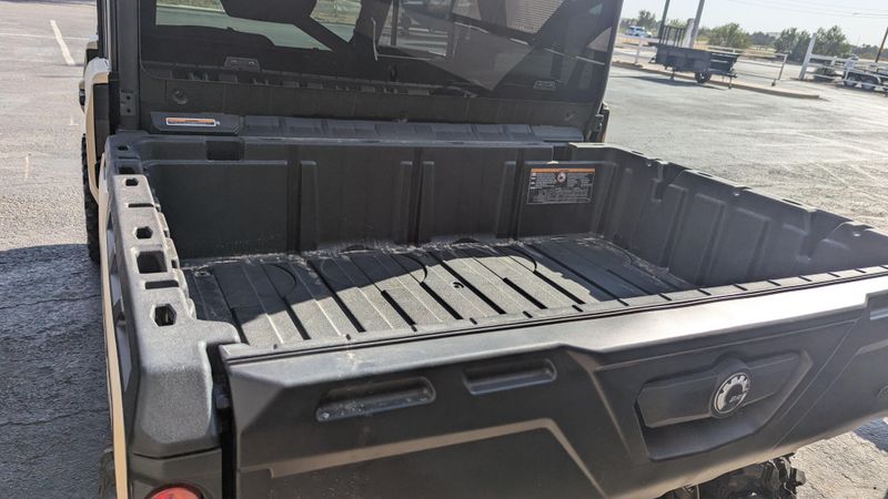 2025 CAN-AM DEFENDER MAX LIMITED CAB HD10 DESERT TAN AND STEALTH BLACK in a DESERT TAN AND STEALTH BLACK exterior color. Family PowerSports (877) 886-1997 familypowersports.com 