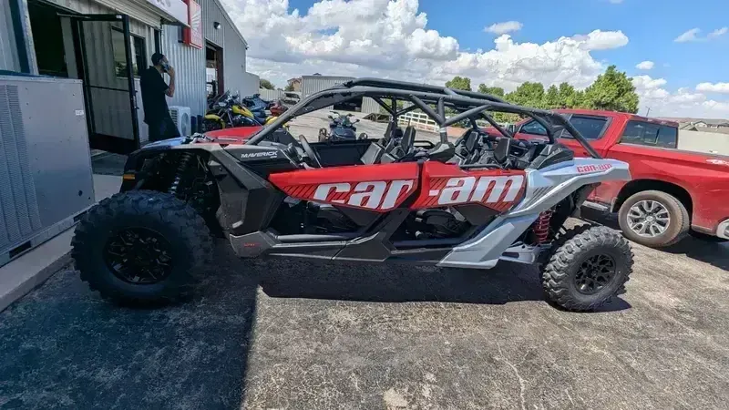 2025 Can-Am MAVERICK MAX DS 64 TURBO FIERY RED AND HYPER SILVERImage 1