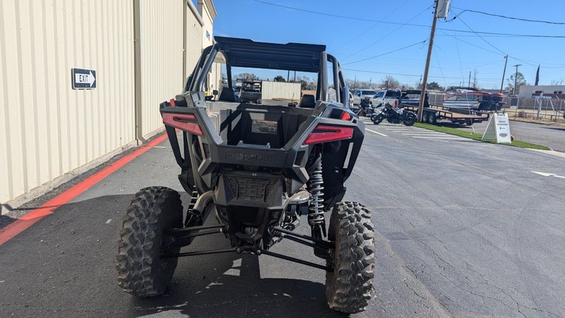 2024 POLARIS RZR PRO XP ULTIMATE  SUPER GRAPHITE in a GRAPHITE exterior color. Family PowerSports (877) 886-1997 familypowersports.com 