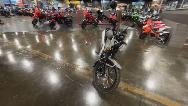 2025 Honda TRAIL 125  in a PEARL SMOKY GRAY exterior color. Del Amo Motorsports of Redondo Beach (424) 390-7811 delamomotorsports.com 
