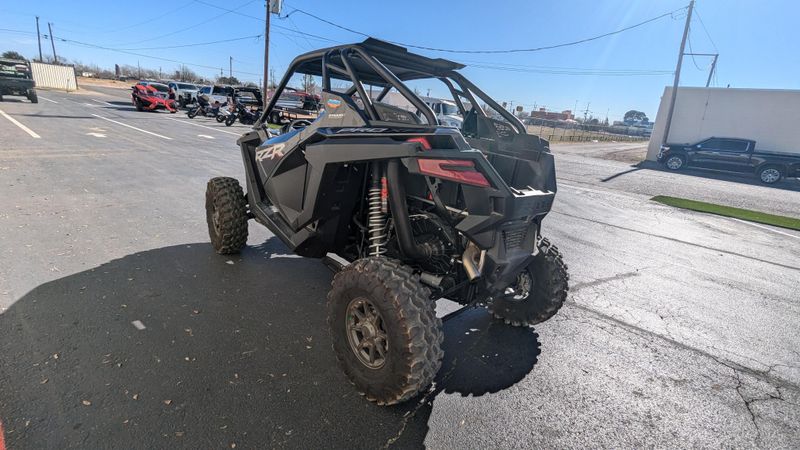 2024 POLARIS RZR PRO XP ULTIMATE  SUPER GRAPHITE in a GRAPHITE exterior color. Family PowerSports (877) 886-1997 familypowersports.com 