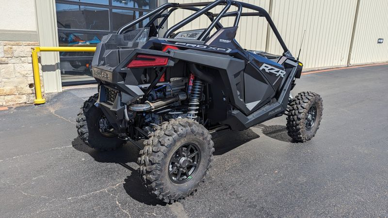2024 POLARIS RZR PRO XP ULTIMATE  SUPER GRAPHITE in a GRAPHITE exterior color. Family PowerSports (877) 886-1997 familypowersports.com 