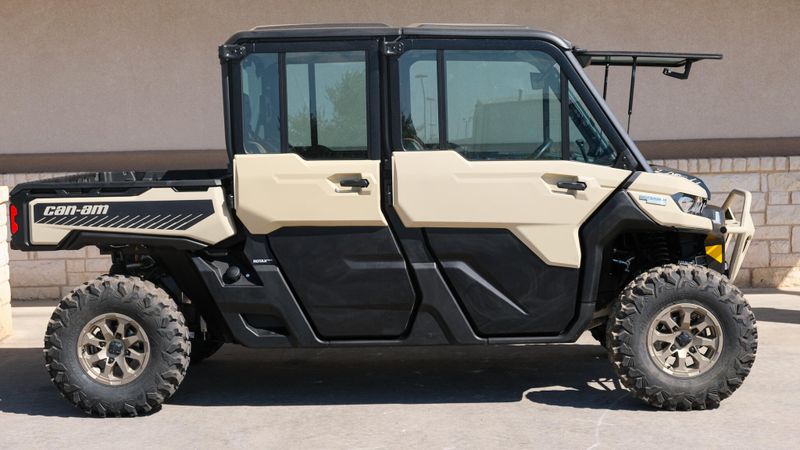 2025 CAN-AM DEFENDER MAX LIMITED CAB HD10 DESERT TAN AND STEALTH BLACK in a DESERT TAN AND STEALTH BLACK exterior color. Family PowerSports (877) 886-1997 familypowersports.com 