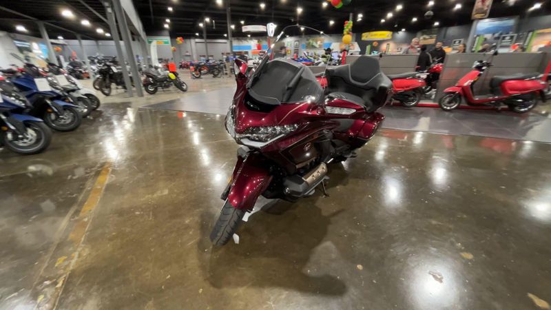 2025 Honda GOLDWING TOUR AIR BAG DCT  in a BORDEAUX RED METALLIC exterior color. Del Amo Motorsports of Redondo Beach (424) 390-7811 delamomotorsports.com 
