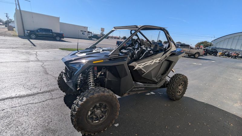 2024 POLARIS RZR PRO XP ULTIMATE  SUPER GRAPHITE in a GRAPHITE exterior color. Family PowerSports (877) 886-1997 familypowersports.com 