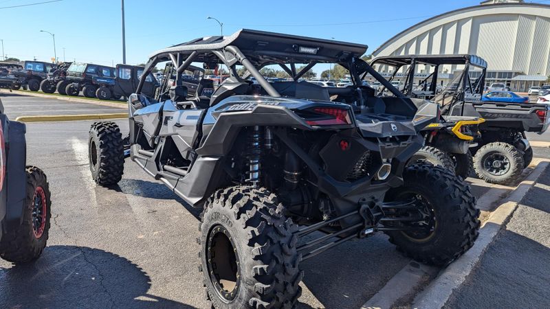 2025 CAN-AM MAVERICK X3 MAX X RS TURBO RR TRIPLE BLACK in a TRIPLE BLACK exterior color. Family PowerSports (877) 886-1997 familypowersports.com 