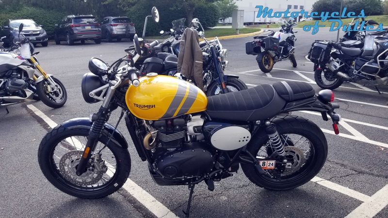 2024 Triumph Scrambler 900  in a Cosmic Yellow/Graphite exterior color. Motorcycles of Dulles 571.934.4450 motorcyclesofdulles.com 