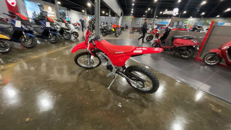 2025 Honda CRF125F BIG WHEEL  in a RED exterior color. Del Amo Motorsports of Redondo Beach (424) 390-7811 delamomotorsports.com 