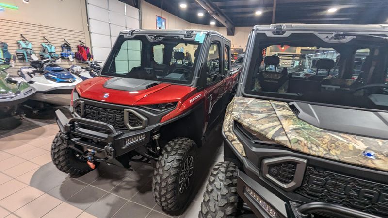 2024 POLARIS RANGER CREW XD 1500 NORTHSTAR EDITION ULTIMATE SUNSET RED in a SUNSET RED exterior color. Family PowerSports (877) 886-1997 familypowersports.com 