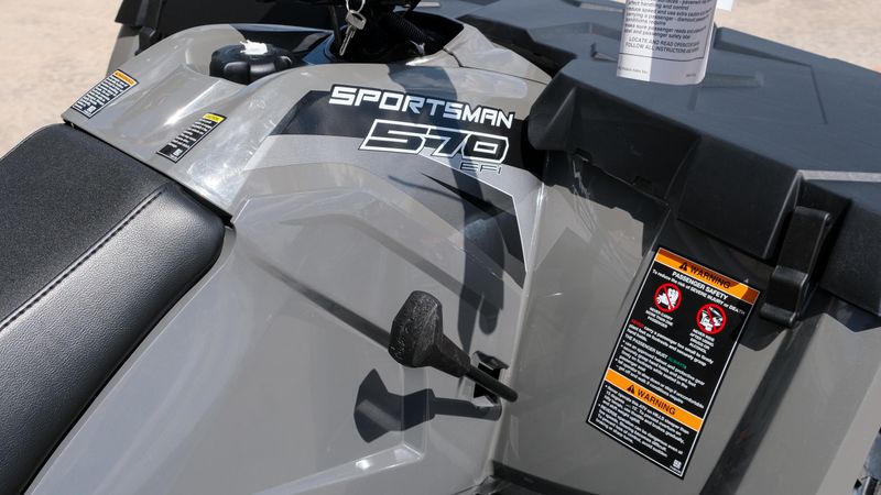 2025 POLARIS SPORTSMAN TOURING 570 EPS STEALTH GRAY in a STEALTH GRAY exterior color. Family PowerSports (877) 886-1997 familypowersports.com 