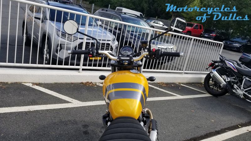 2024 Triumph Scrambler 900  in a Cosmic Yellow/Graphite exterior color. Motorcycles of Dulles 571.934.4450 motorcyclesofdulles.com 