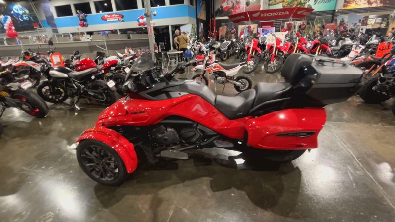 2022 Can-Am H7NA  in a PLASMA RED/ CARBON BLACK exterior color. Del Amo Motorsports delamomotorsports.com 