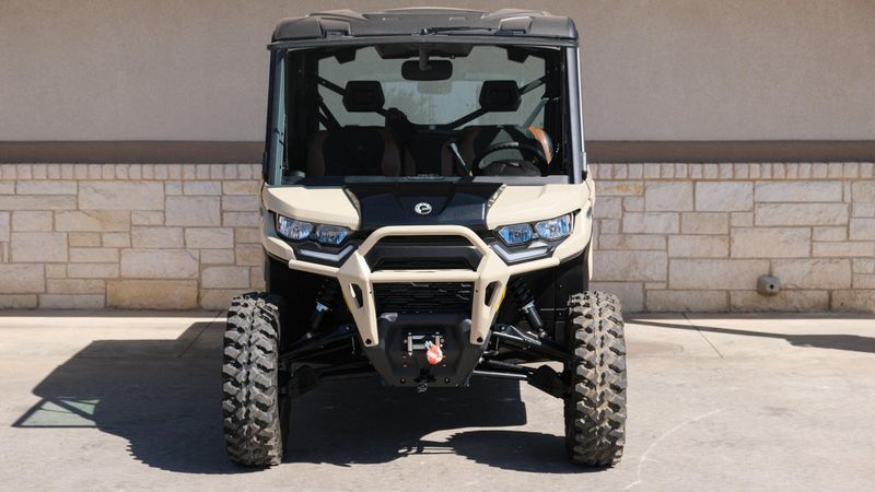 2025 CAN-AM DEFENDER MAX LIMITED CAB HD10 DESERT TAN AND STEALTH BLACK in a DESERT TAN AND STEALTH BLACK exterior color. Family PowerSports (877) 886-1997 familypowersports.com 