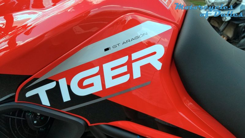 2024 Triumph Tiger 900 Aragon GT  in a Diablo Red/Phantom Black exterior color. Motorcycles of Dulles 571.934.4450 motorcyclesofdulles.com 