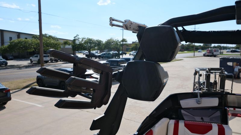 2025 MALIBU WAKESETTER 25 LSV  in a RED-BLACK-WHITE exterior color. Family PowerSports (877) 886-1997 familypowersports.com 