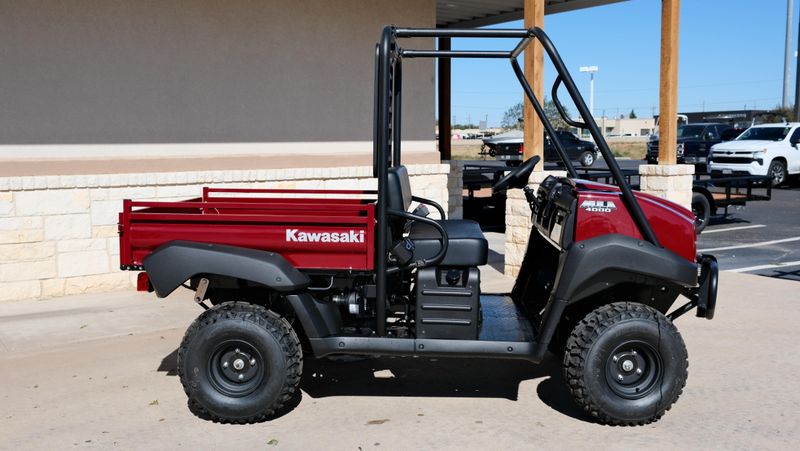 NEW 2026 KAWASAKI MULE 4010 4X4  in a DARK ROYAL RED exterior color. Family PowerSports (877) 886-1997 familypowersports.com