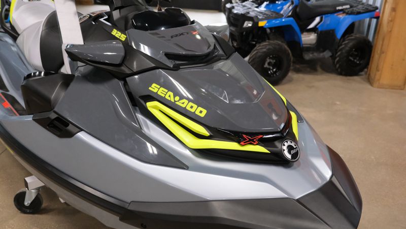 2024 SEADOO PWC RXT X 325 AUD GY IBR 24  in a GREEN exterior color. Family PowerSports (877) 886-1997 familypowersports.com 