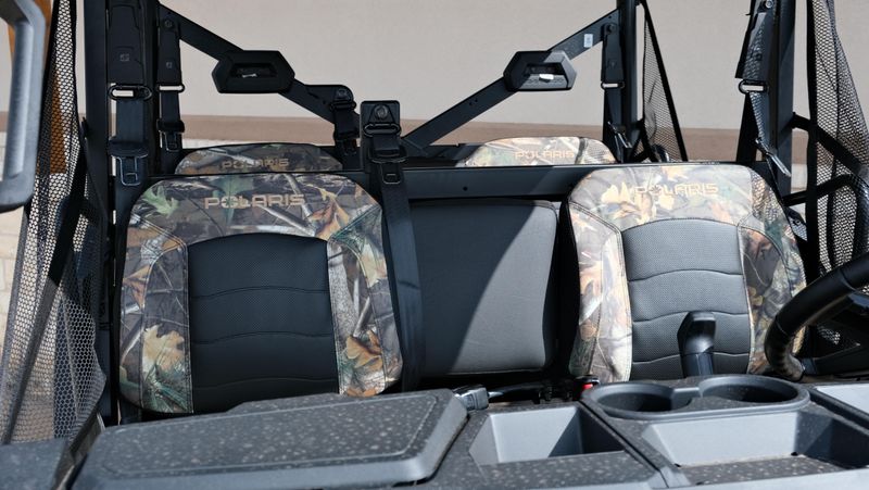 2025 POLARIS RANGER CREW 1000 PREMIUM PURSUIT CAMO in a POLARIS PURSUIT CAMO exterior color. Family PowerSports (877) 886-1997 familypowersports.com 