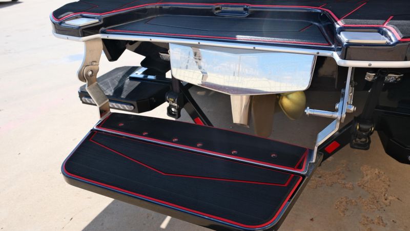 2025 MALIBU WAKESETTER 25 LSV  in a RED-BLACK-WHITE exterior color. Family PowerSports (877) 886-1997 familypowersports.com 
