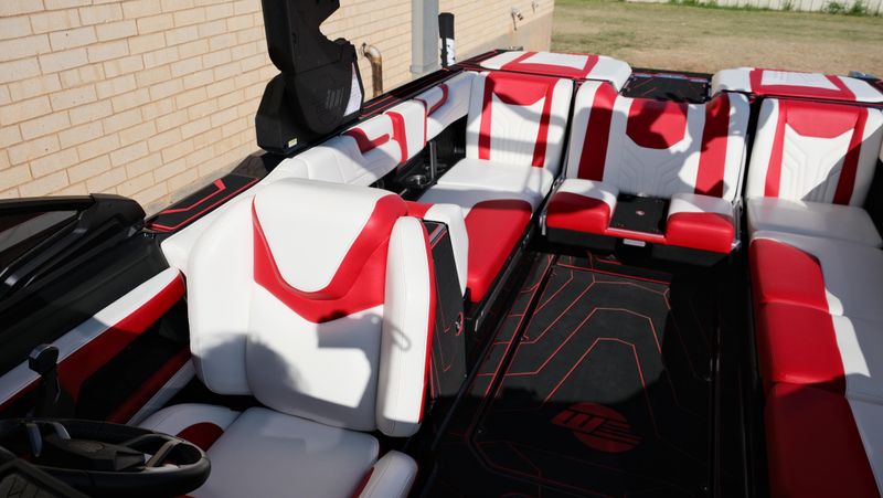 2025 MALIBU WAKESETTER 25 LSV  in a RED-BLACK-WHITE exterior color. Family PowerSports (877) 886-1997 familypowersports.com 