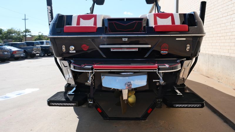 2025 MALIBU WAKESETTER 25 LSV  in a RED-BLACK-WHITE exterior color. Family PowerSports (877) 886-1997 familypowersports.com 