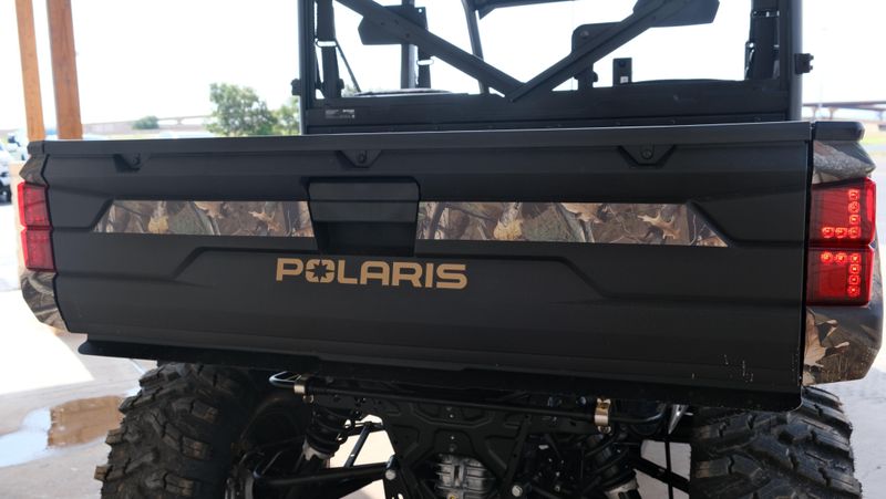 2025 POLARIS RANGER CREW 1000 PREMIUM PURSUIT CAMO in a POLARIS PURSUIT CAMO exterior color. Family PowerSports (877) 886-1997 familypowersports.com 