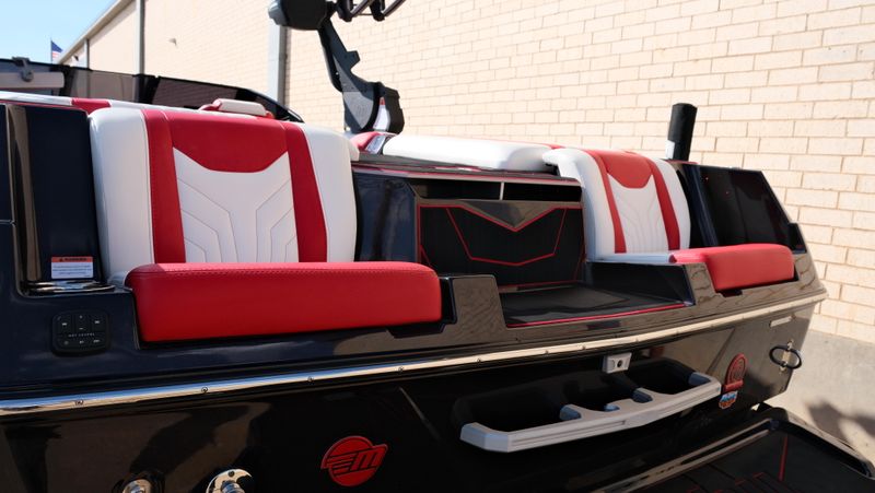 2025 MALIBU WAKESETTER 25 LSV  in a RED-BLACK-WHITE exterior color. Family PowerSports (877) 886-1997 familypowersports.com 