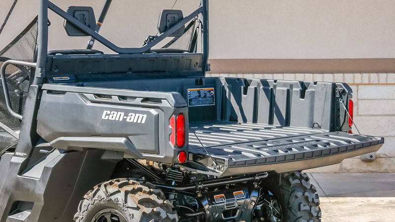 2024 CAN-AM DEFENDER DPS HD9 WILDLAND CAMO in a CAMO exterior color. Family PowerSports (877) 886-1997 familypowersports.com 
