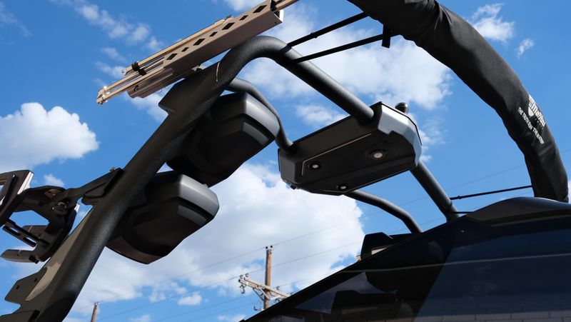 2025 MALIBU WAKESETTER 25 LSV  in a RED-BLACK-WHITE exterior color. Family PowerSports (877) 886-1997 familypowersports.com 